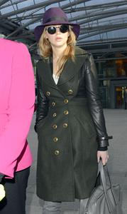 Jennifer Lawrence - Hot hat and glasses at Heathrow Airport in London (08.02.2013) 