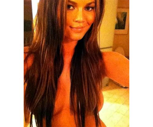 Chrissy Teigen taking a selfie
