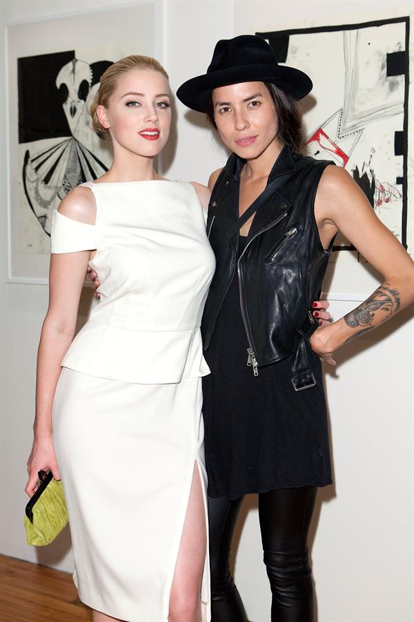 Amber Heard attends Tasya van Rees private viewing of Distorted Delicacies on June 22, 2011