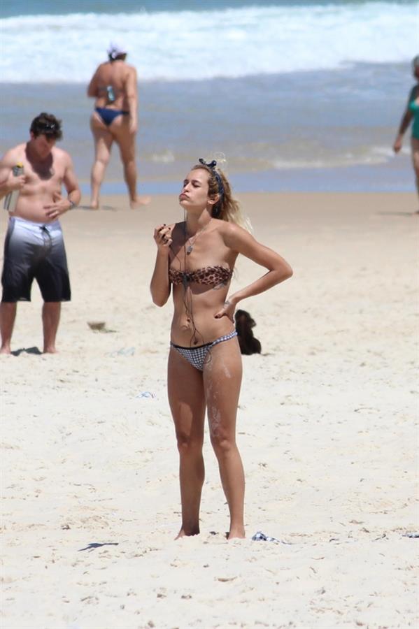 Alice Dellal in a bikini