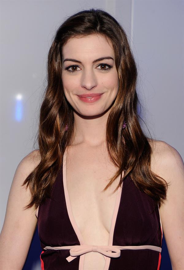 Anne Hathaway attends the 13th annual White Tie Tiara Ball in England on June 23, 2011