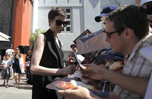 Anne Hathaway Christopher Nolan immortalized with hand and footprint ceremony on July 7, 2012