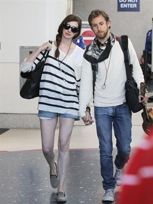 Anne Hathaway arrives at LAX airport in Los Angeles on September 3, 2011