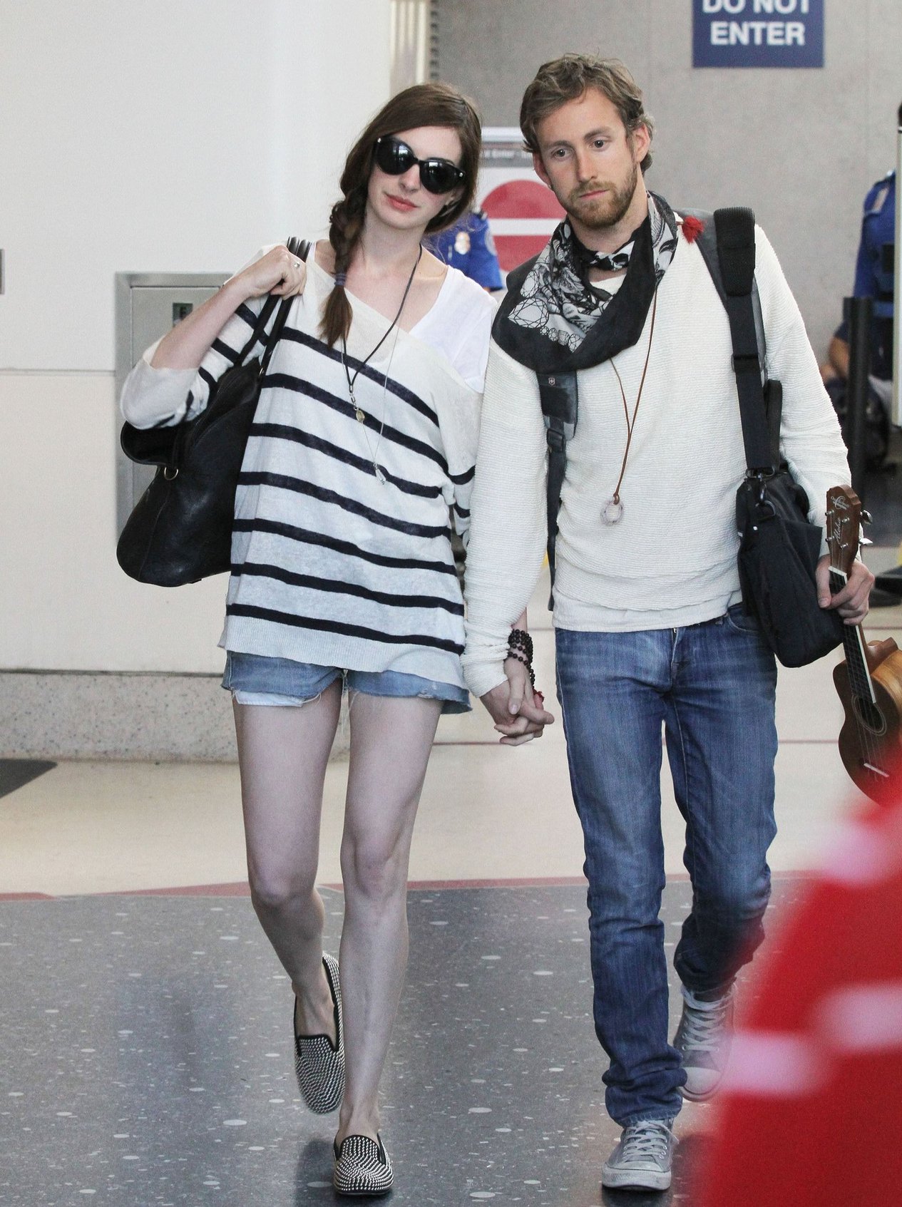 Anne Hathaway arrives at LAX airport in Los Angeles on September 3, 2011