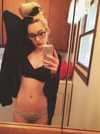 Anonymous in lingerie taking a selfie