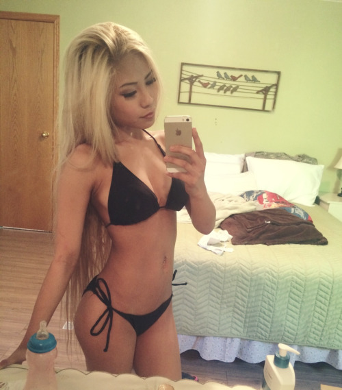 Anonymous in a bikini taking a selfie