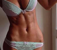 Galinka Mirgaeva in lingerie taking a selfie