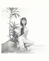 Irene Tsu in a bikini