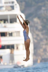 Nina Dobrev in a bikini