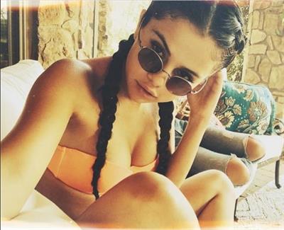 Selena Gomez taking a selfie