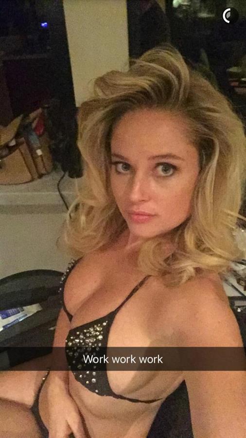 Genevieve Morton in a bikini taking a selfie