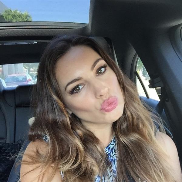 Kelly Brook taking a selfie