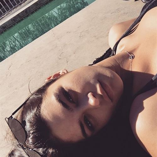Lauren Layne in a bikini taking a selfie
