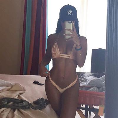 Katya Elise Henry in a bikini taking a selfie