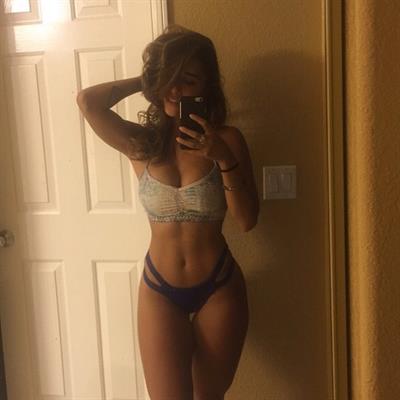 Tianna Gregory in lingerie taking a selfie