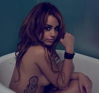 Miley Cyrus Naked in a bathtub
