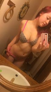 Anonymous in lingerie taking a selfie