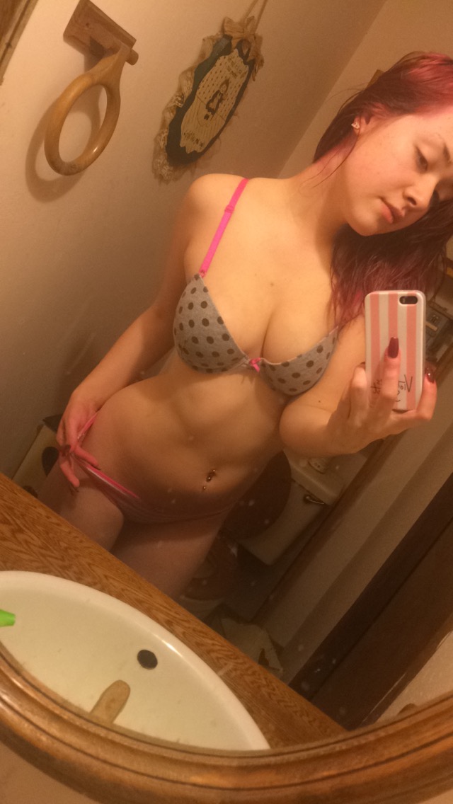 Anonymous in lingerie taking a selfie