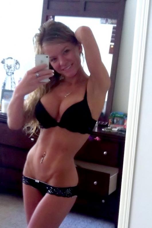 Anonymous in a bikini in lingerie taking a selfie
