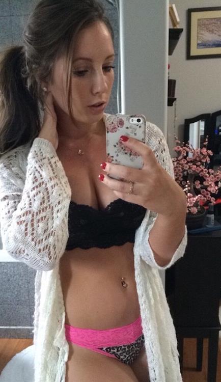 Anonymous in lingerie taking a selfie