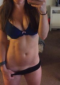 Anonymous in a bikini taking a selfie