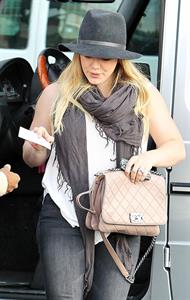Hilary Duff Out in Los Angeles, August 30, 2012.  She's wearing jeans and a hat