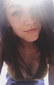 Anonymous in a bikini taking a selfie