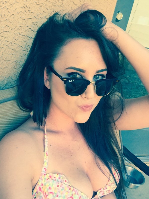 Anonymous in a bikini taking a selfie