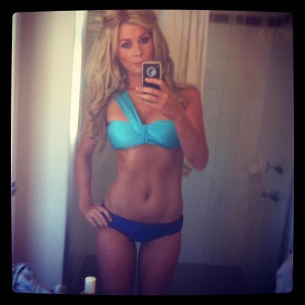 Sheridyn Fisher in a bikini taking a selfie