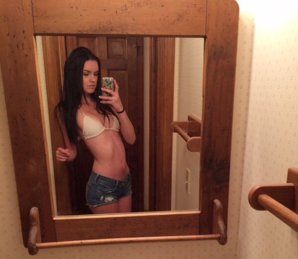 Anonymous in a bikini taking a selfie