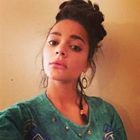 Sasha Lane taking a selfie