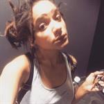 Sasha Lane taking a selfie