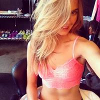 Bridget Malcolm in lingerie taking a selfie