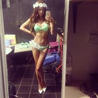 Laura Carter in a bikini taking a selfie