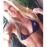 Bri Teresi in a bikini taking a selfie