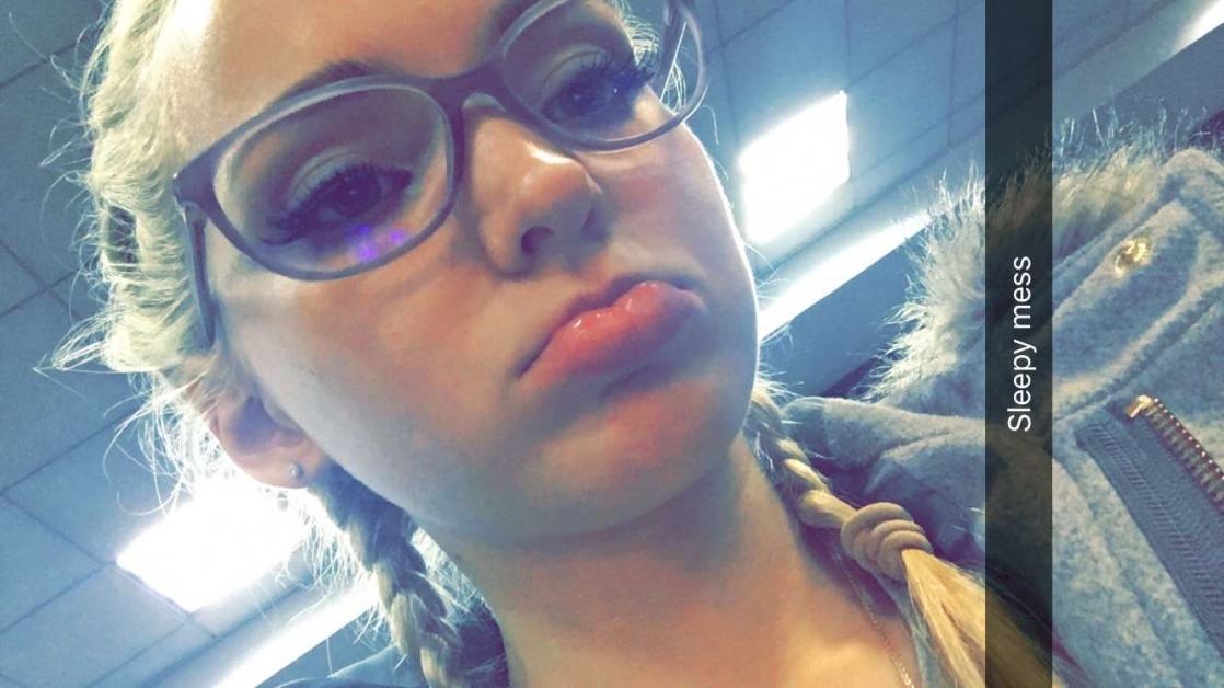 Dove Cameron taking a selfie