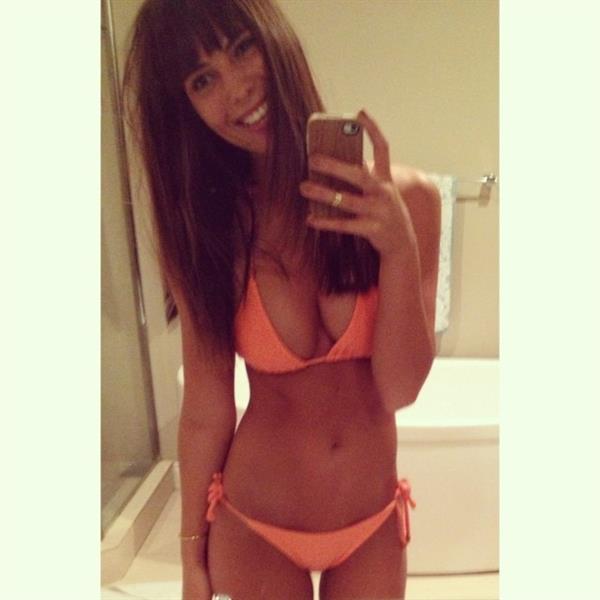 Brittny Ward in a bikini taking a selfie