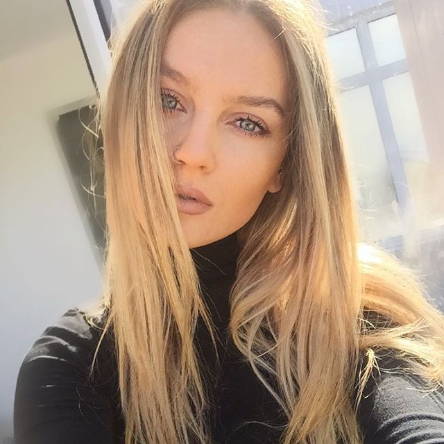 Perrie Edwards taking a selfie