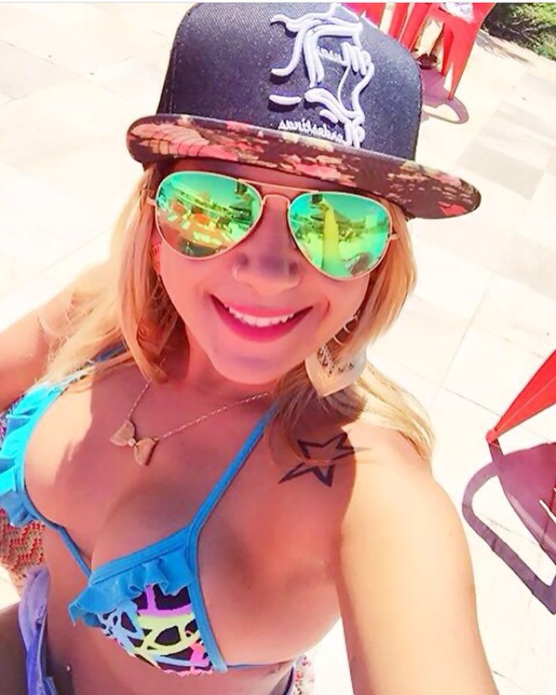 Anonymous in a bikini taking a selfie