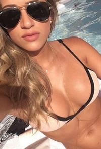 Cindy Prado in a bikini taking a selfie