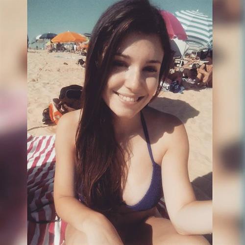 Carolina Neto in a bikini taking a selfie