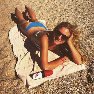 Emma Coburn in a bikini - ass