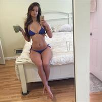 Hannah Stocking in a bikini taking a selfie