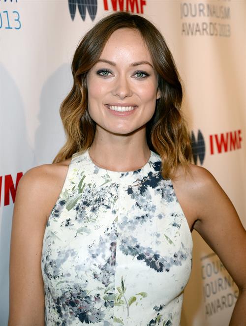 Olivia Wilde debuts her small baby bump while attending the 2013 International Women’s Media Foundation’s Courage in Journalism Awards at the Beverly Hills Hotel on Tuesday (October 29, 2013) in Beverly Hills, Calif.
