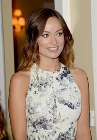 Olivia Wilde debuts her small baby bump while attending the 2013 International Women’s Media Foundation’s Courage in Journalism Awards at the Beverly Hills Hotel on Tuesday (October 29, 2013) in Beverly Hills, Calif.