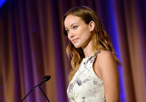 Olivia Wilde debuts her small baby bump while attending the 2013 International Women’s Media Foundation’s Courage in Journalism Awards at the Beverly Hills Hotel on Tuesday (October 29, 2013) in Beverly Hills, Calif.