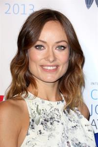 Olivia Wilde debuts her small baby bump while attending the 2013 International Women’s Media Foundation’s Courage in Journalism Awards at the Beverly Hills Hotel on Tuesday (October 29, 2013) in Beverly Hills, Calif.