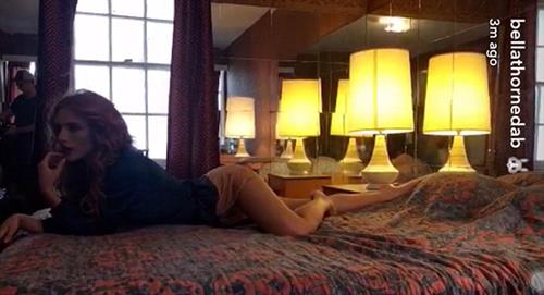 Bella flaunted her sexy body in a pantie, a red dress and jacket combo