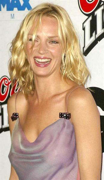 Uma Thurman in a purple dress