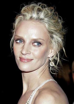 Uma Thurman in a white dress